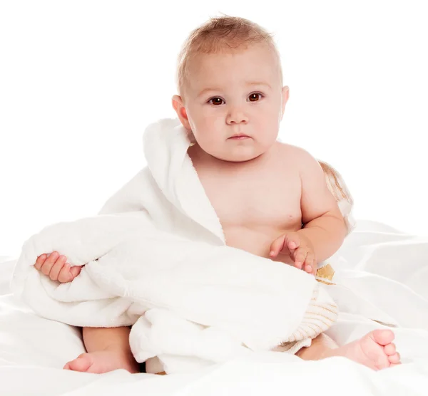 Kleiner Junge in einer Decke — Stockfoto