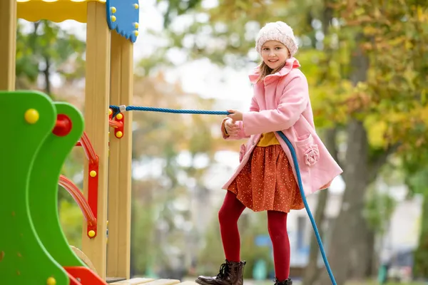 School girl on playground — Stock Photo, Image