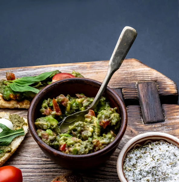 Guacamole and salt with bruschettas — Stock Photo, Image