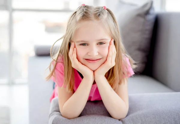 Girl resting with head on hands — Stock Photo, Image