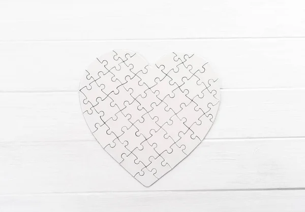 Puzzle in form of heart — Stock Photo, Image