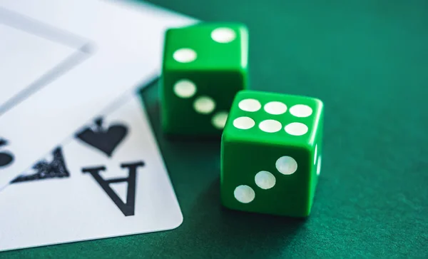 Green dice and playing cards — Stock Photo, Image