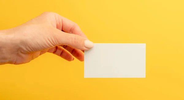 White Business Card Copy Space Female Hand Yellow Background Identity — Stockfoto