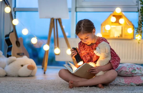 Little Girl Reading Fairy Tales Book Evening Lantern Going Sleep — Zdjęcie stockowe