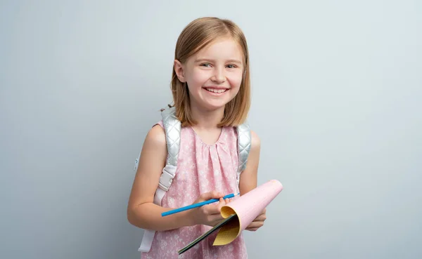 Little Girl Taking Notes Notebook Using Colored Pencil — Foto Stock