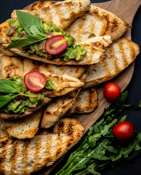 Bruschettas French Toasts Guacamole Basil Cherry Tomatoes Wooden Board Mexican — Stock Photo, Image