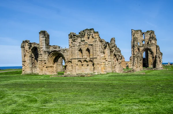 Le rovine del priorato e del castello di Tynemouth Fotografia Stock