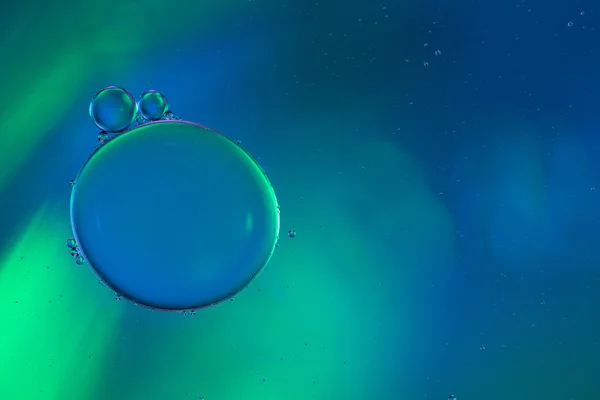 Abstract two bubbles of water bonding to a another — Stock Photo, Image