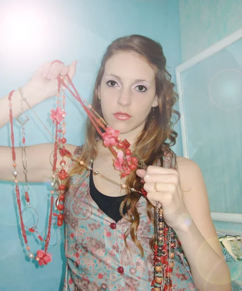 Woman showing jewelery — Stock Photo, Image