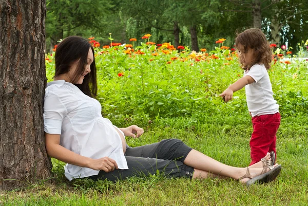 Pregnant woman with baby girl Stock Photo