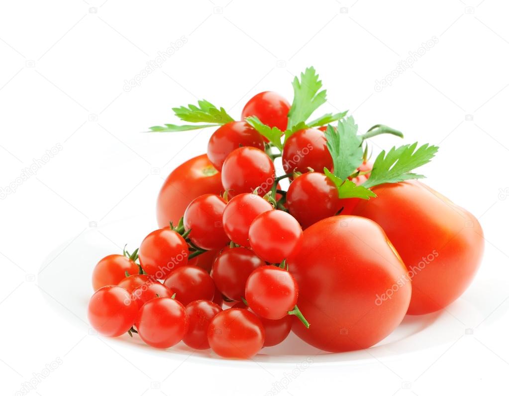 fresh tomatoes and parsley isolated