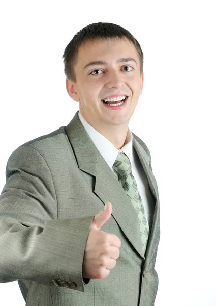Šťastný obchodní muž drží palce — Stock fotografie