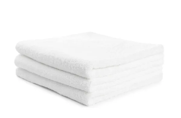 Pilha de toalhas brancas isoladas Imagem De Stock