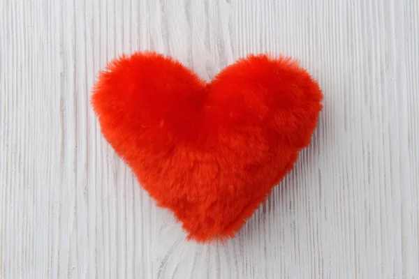 Red heart on white wooden background — Stock Photo, Image