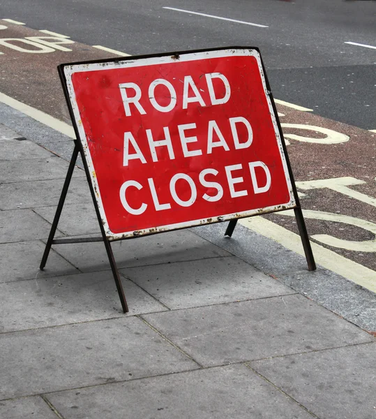 Grungy road closed sign — Stock Photo, Image