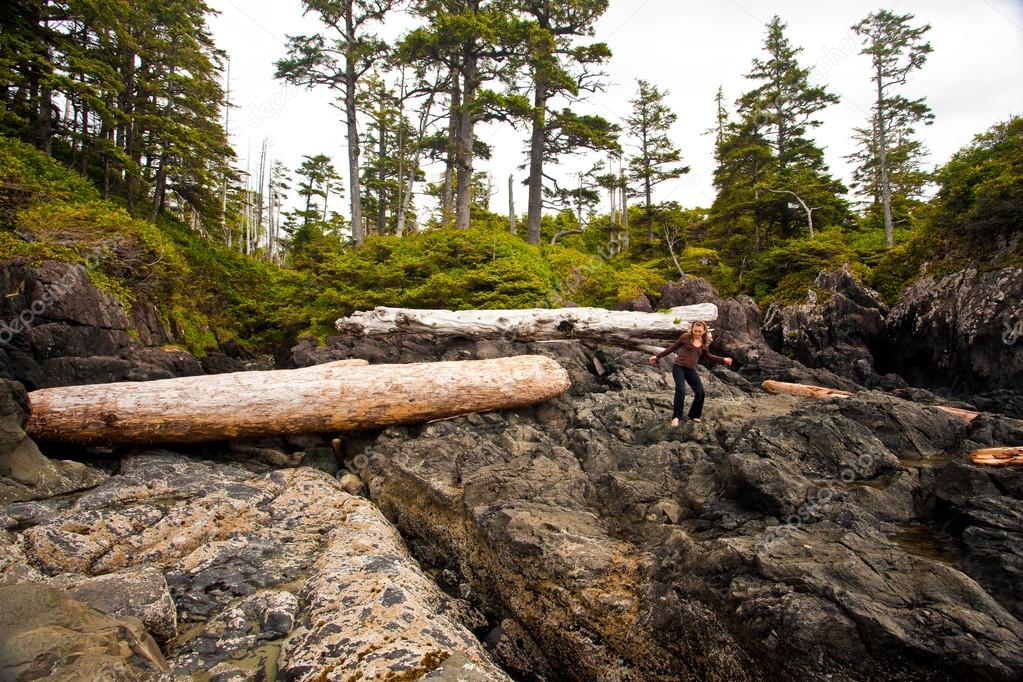 Person exploring a wilderness landscape