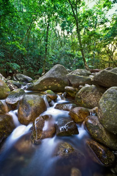 Flowing water in a rocky stream — Stock Photo, Image