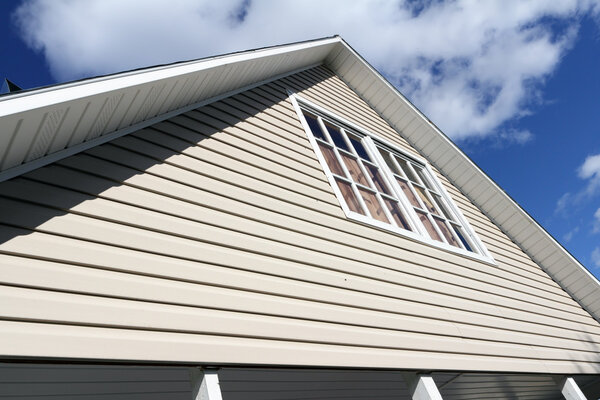 House exterior, roof close-up. Low angle view.