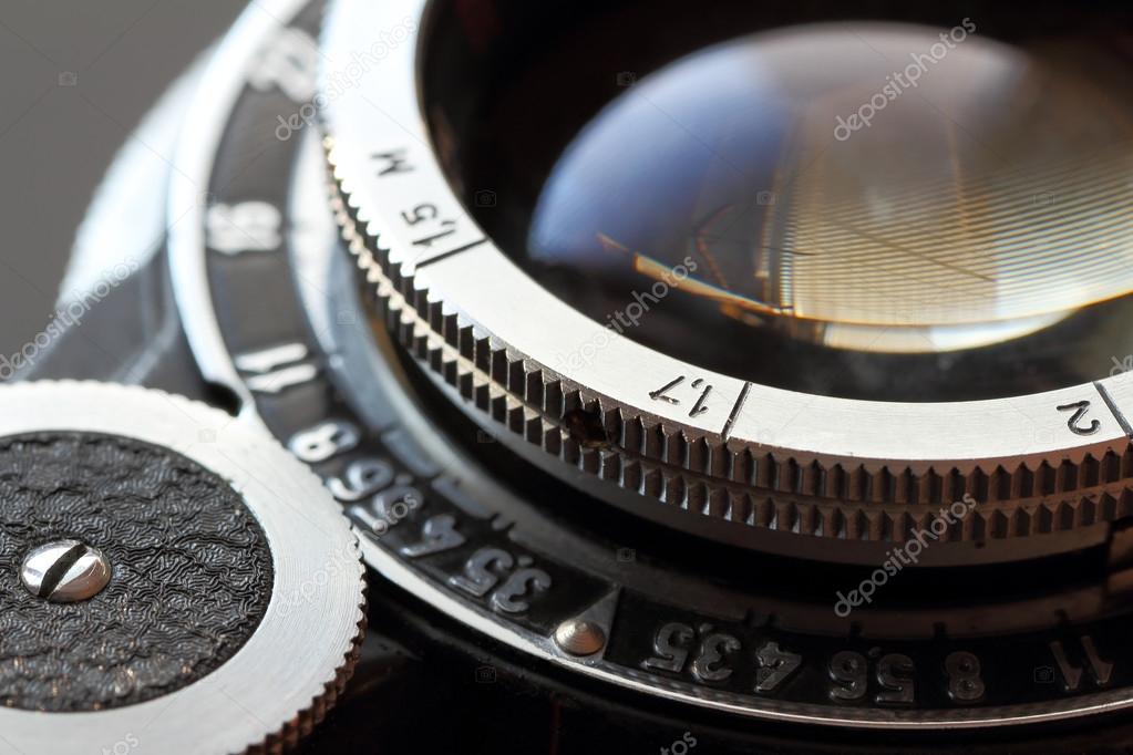 Retro camera lens closeup. — Stock Photo © UltraONE 27166355