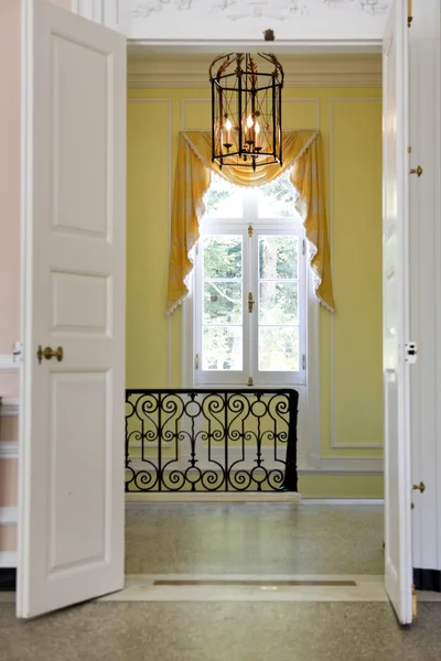 Historical home details with open doors, window and staircase. — Stock Photo, Image