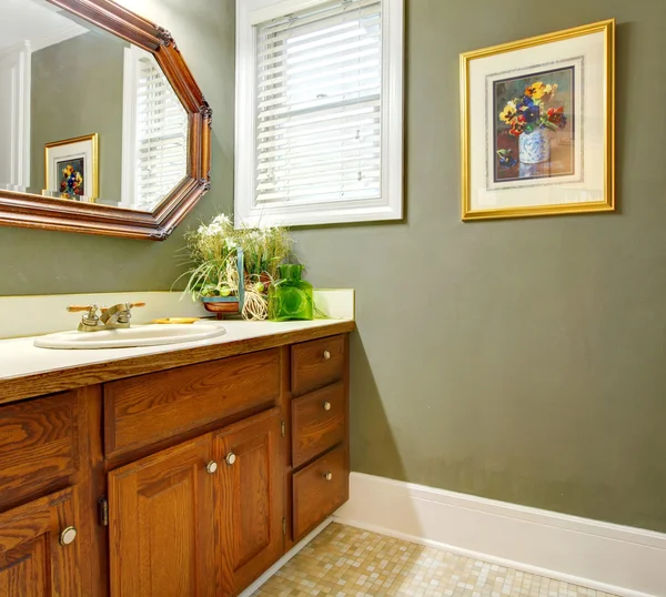 Classic simple green bathroom with wood cabinets. — Stock Photo, Image