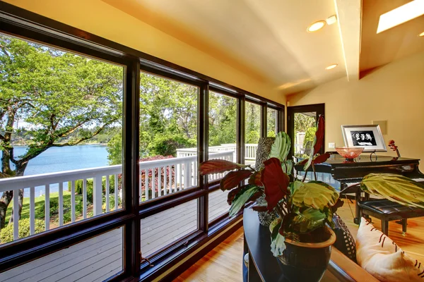 Open modern luxury home interior living room wth balcony window wall. — Stock Photo, Image