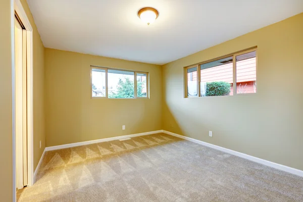 Empty new bedroom with green walls interior. — Stock Photo, Image