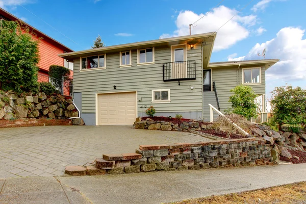 Grey green newly remodeled two level house exterior. — Stock Photo, Image