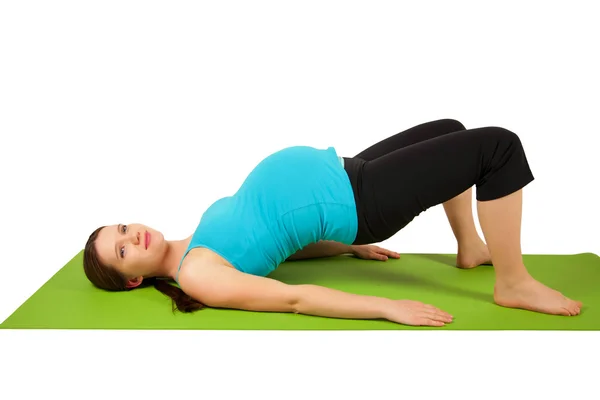 Pregnant young women stretching and exercising. — Stock Photo, Image