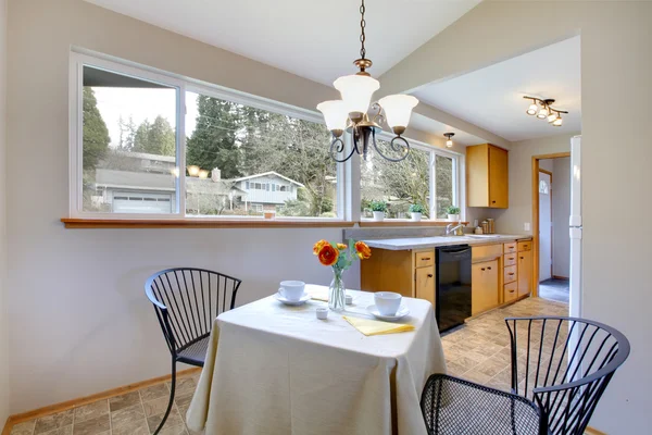 Little dining area in a bright kitchen room — Stock Photo, Image