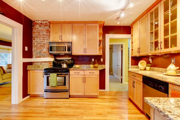 Bright kitchen room with brick designed wall — Stock Photo, Image