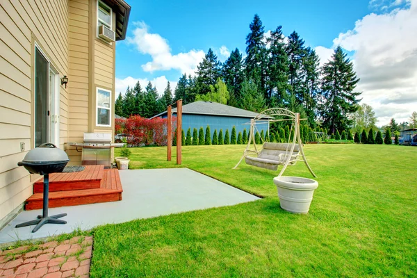 Backyard deck with swing — Stock Photo, Image