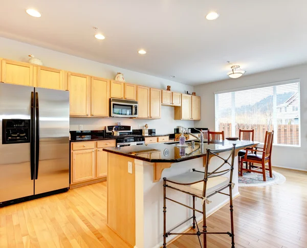 Large bright kitchen room with dining area — Stock Photo, Image