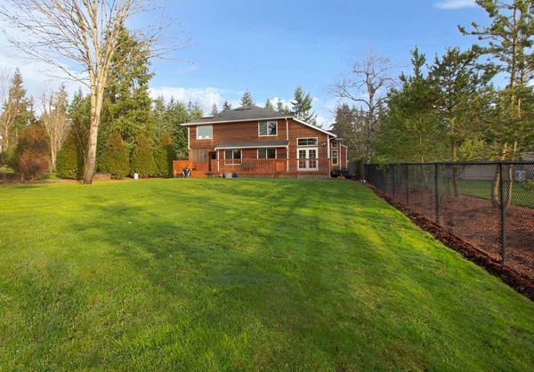 Back of the cedar house with deck — Stock Photo, Image