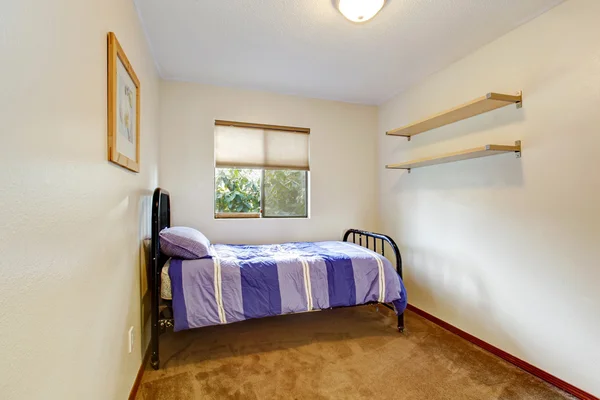 Small rectagle bedroom with an old metal frame bed — Stock Photo, Image