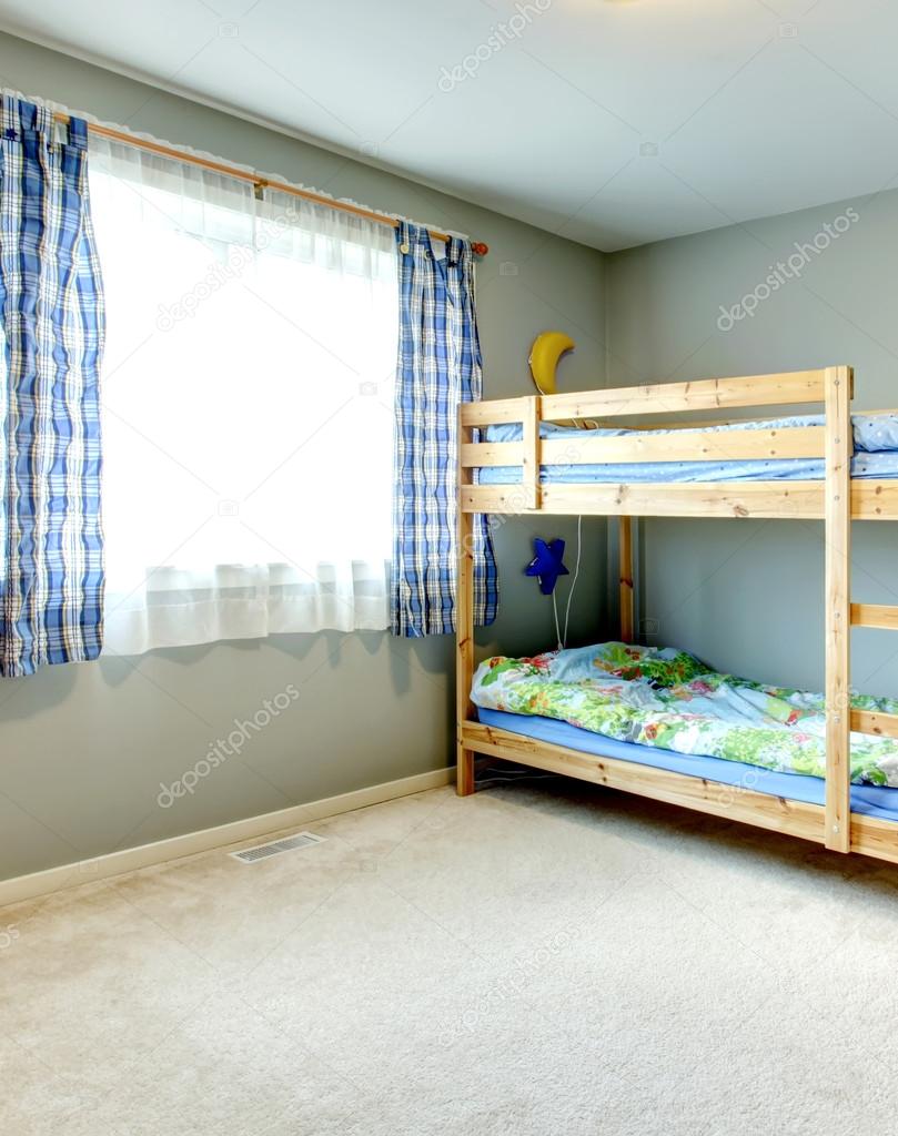 Cozy kids room with a two level bed