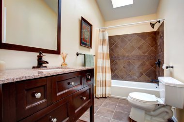 Elegant bathroom with tile wall trim clipart