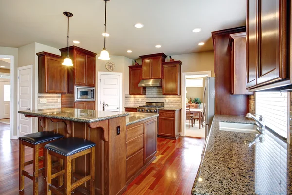 Modern kitchen room with oak cabinets — Stock Photo, Image