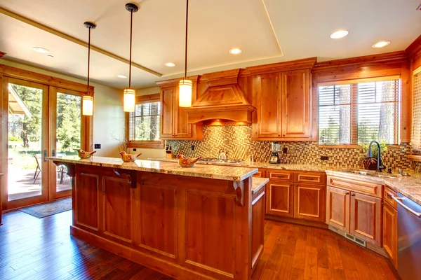 Spacious kitchen room with island — Stock Photo, Image