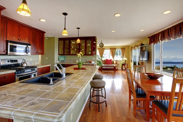 Open floor plan. Kitchen and dining area — Stock Photo, Image