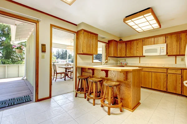 Rustic kitchen room with walkout deck — Stock Photo, Image