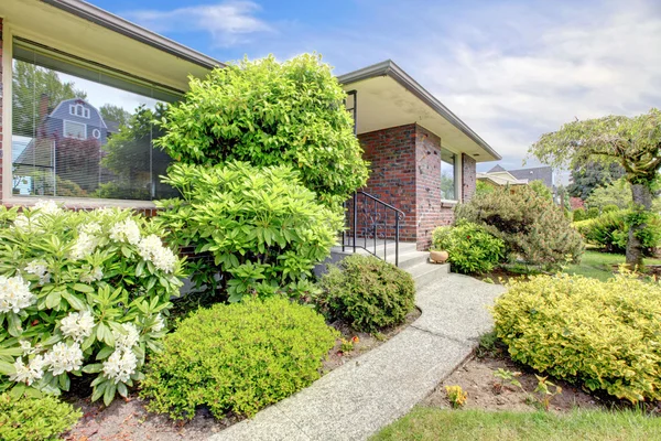 Brick house with landscape — Stock Photo, Image