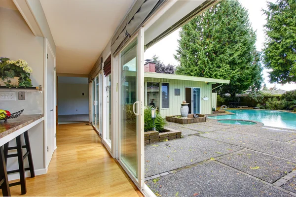 View of corridor and walkout deck to backyard — Stock Photo, Image