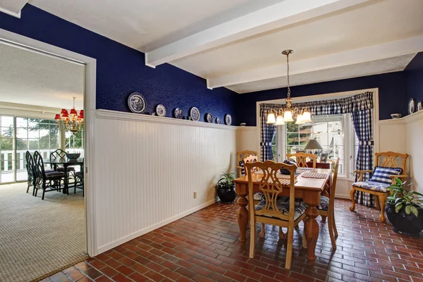 Dining room inteiror with brick floor and royal wall — Stock Photo, Image