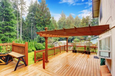 Walkout deck with attached pergola clipart