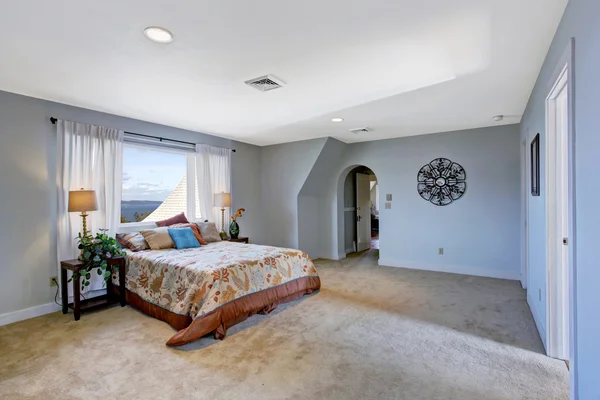 Spacious bedroom interior in light blue color — Stock Photo, Image