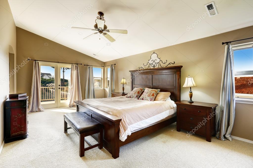 Luxury bedroom with walkout deck