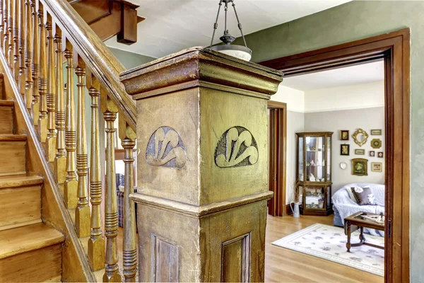 Old staircase with wooden carved pole — Stock Photo, Image