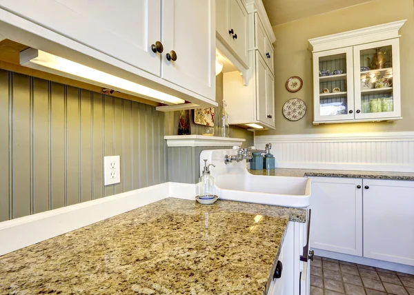 White kitchen cabinets with granite tops — Stock Photo, Image