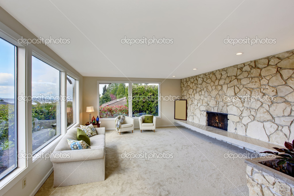 Bright Living Room With Rock Wall Trim And Fireplace Stock Photo Bright Living Room With Rock Wall Trim And Fireplace Stock Image
